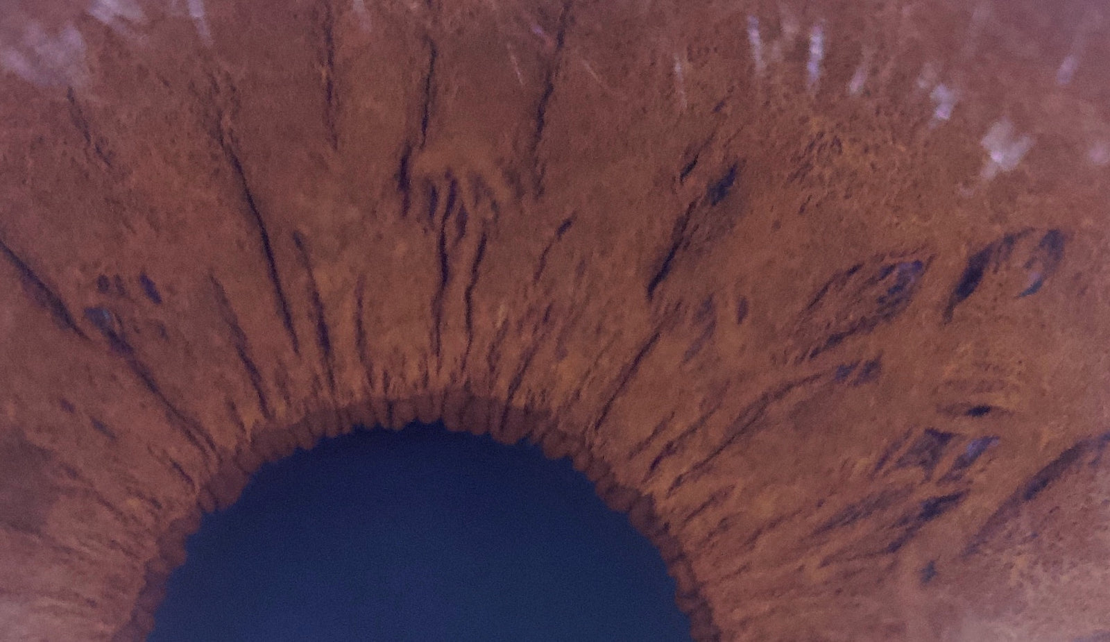 Close-up of IrisLab's 'Hematogene' product, highlighting its sleek design and colourful packaging.